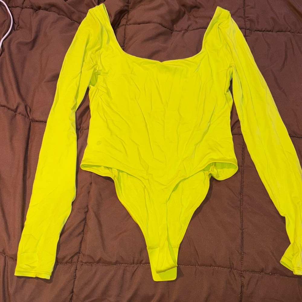 never worn lime green bodysuit